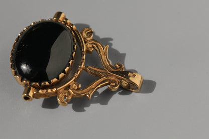Vintage spinning fob with tigers eye and onyx, in 9 carat gold