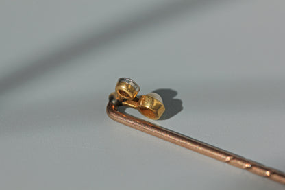 Antique old cut diamond and pearl toi et moi stick pin, in 18ct gold