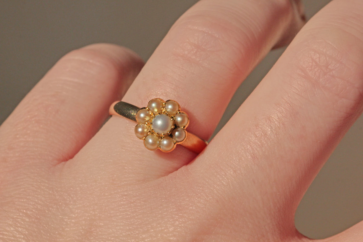 Vintage cultured pearl floral cluster ring in 9ct gold on finger
