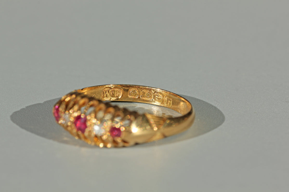 Antique 18ct gold hallmarks on a gold ring with date letter for 1916