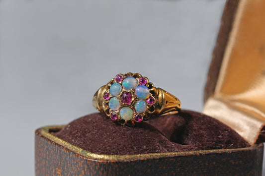 antique 18ct gold opal flower ring with celestial shoulders