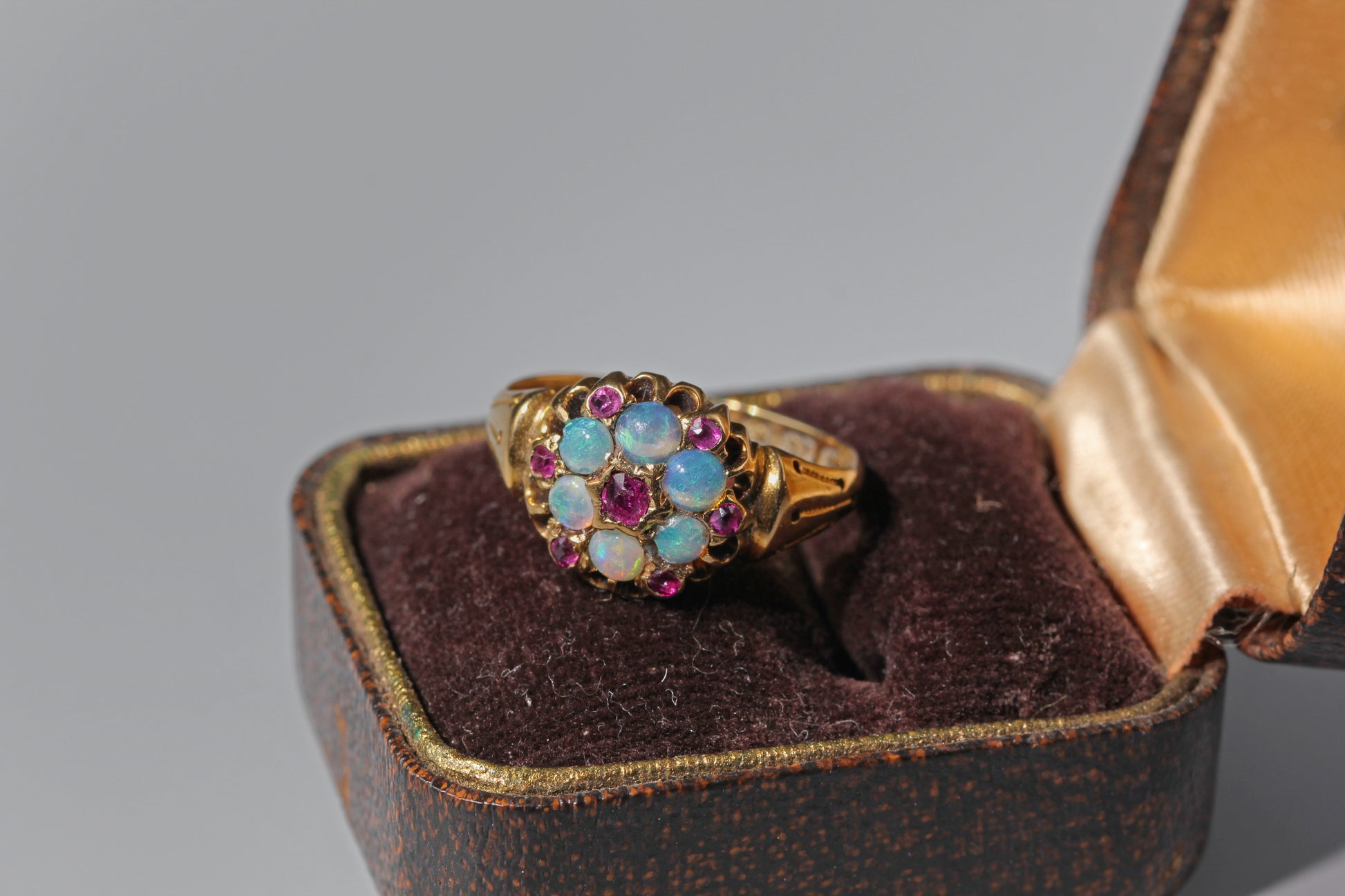 antique engagement ring with opal and amethysts