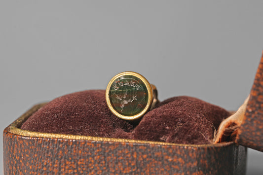 Antique bloodstone intaglio fob with dove and peace engraving
