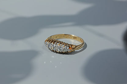 Side view of scroll shoulders on 18ct gold antique diamond ring