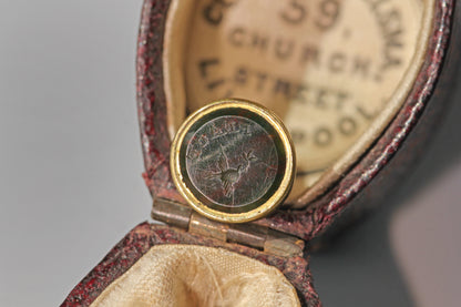 Small antique bloodstone intaglio seal charm
