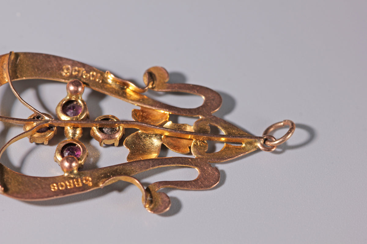Antique Edwardian pendant showing 9ct gold mark to reverse
