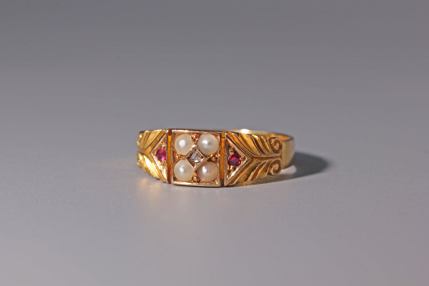 Antique engagement ring with pearls and diamonds