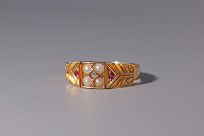 Antique engagement ring with pearls and diamonds