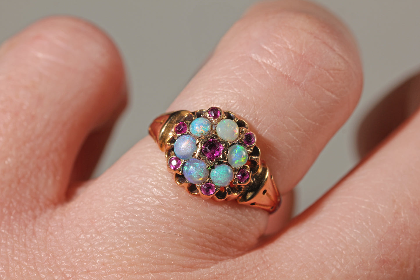 Antique victorian opal ring in 18ct worn on finger