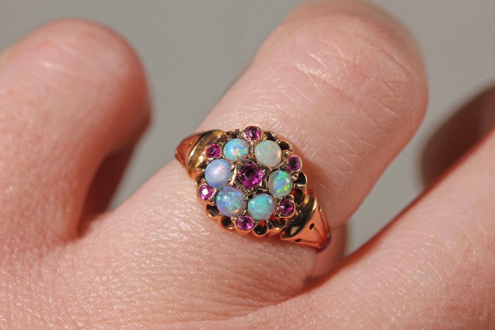 Antique victorian opal ring in 18ct worn on finger