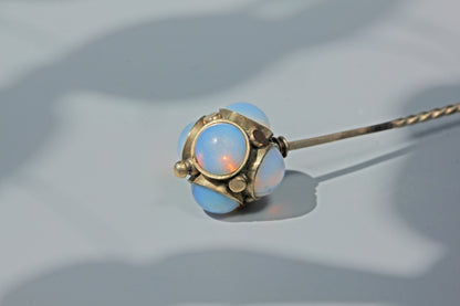 Antique early 20th century 9ct gold stick pin with opaline cabochons