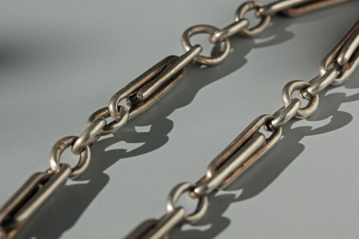 Fancy link details on antique sterling silver watch chain 