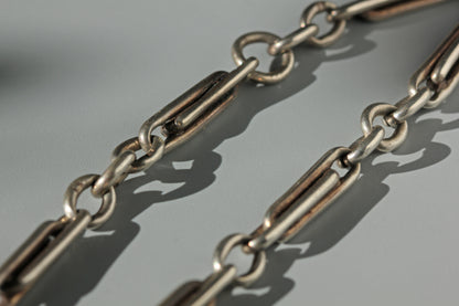 Fancy link details on antique sterling silver watch chain 