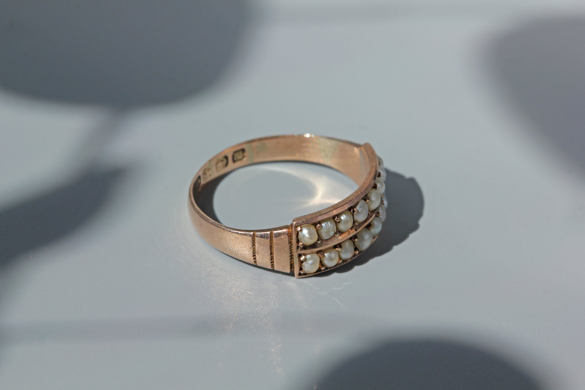 shoulder detail of antique gold pearl ring