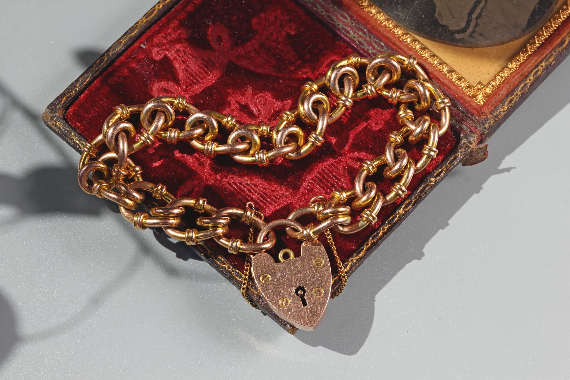 Chunky antique 9ct gold fancy link bracelet with heart padlock clasp
