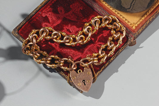 Chunky antique 9ct gold fancy link bracelet with heart padlock clasp
