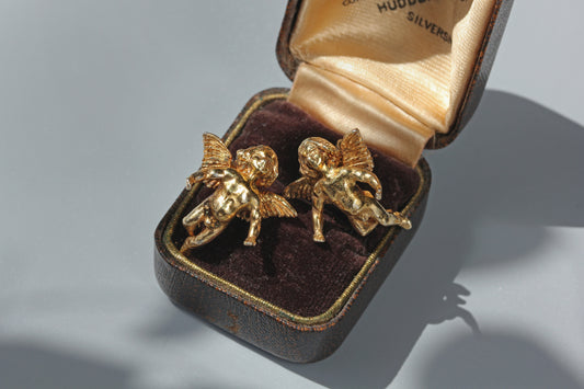 Vintage sterling silver gilt angel stud earrings with detailed wings
