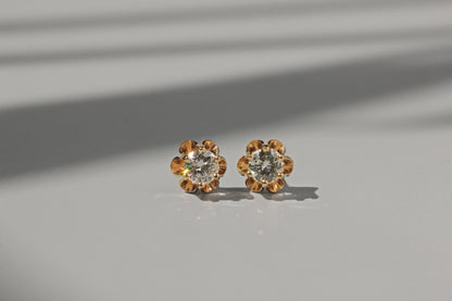 Vintage diamond solitaire buttercup belcher earrings, in 14 carat gold