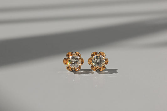 Vintage diamond solitaire buttercup belcher earrings, in 14 carat gold