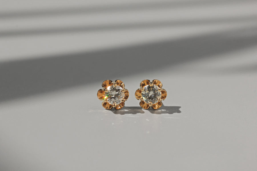 Vintage diamond solitaire buttercup belcher earrings, in 14 carat gold