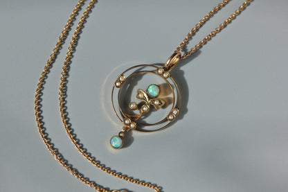 Edwardian 9ct gold opal and pearl pendant on a cable chain