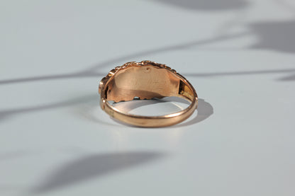 Interior view of antique garnet ring setting and band
