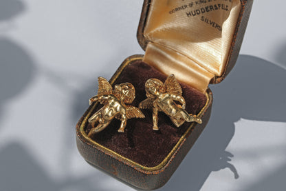 Renaissance inspired putti earrings crafted in sterling silver gilt in antique box