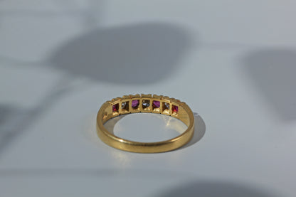 Rear view of open back setting on ruby and diamond ring 