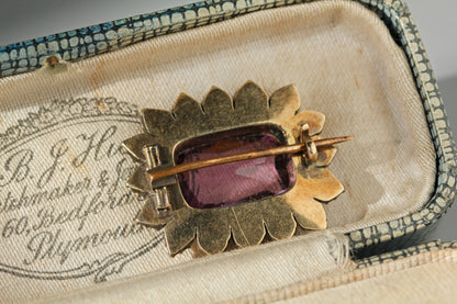 Antique brooch clasp details, with a tube hinge and c-catch closure on a 9ct gold frame, displayed in an antique jewellery 