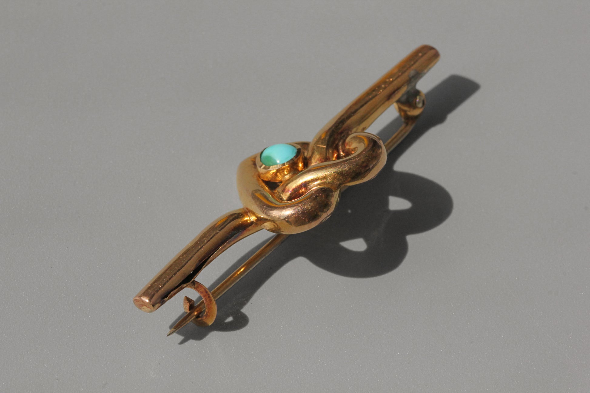 Turquoise stone on heart shaped edwardian brooch
