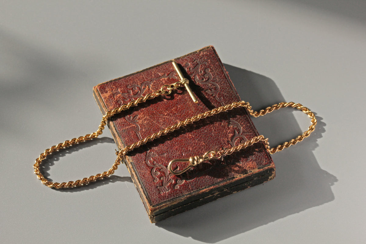 Antique Victorian rope link twist chain with T-bar in 9 carat gold close view