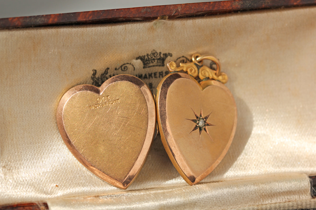 Vintage celestial love heart locket with a rose cut diamond, with clear 9ct gold hallmarks on an antique jewellery box