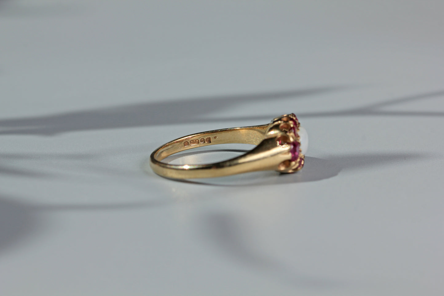 Close up of gold hallmarks on vintage ring