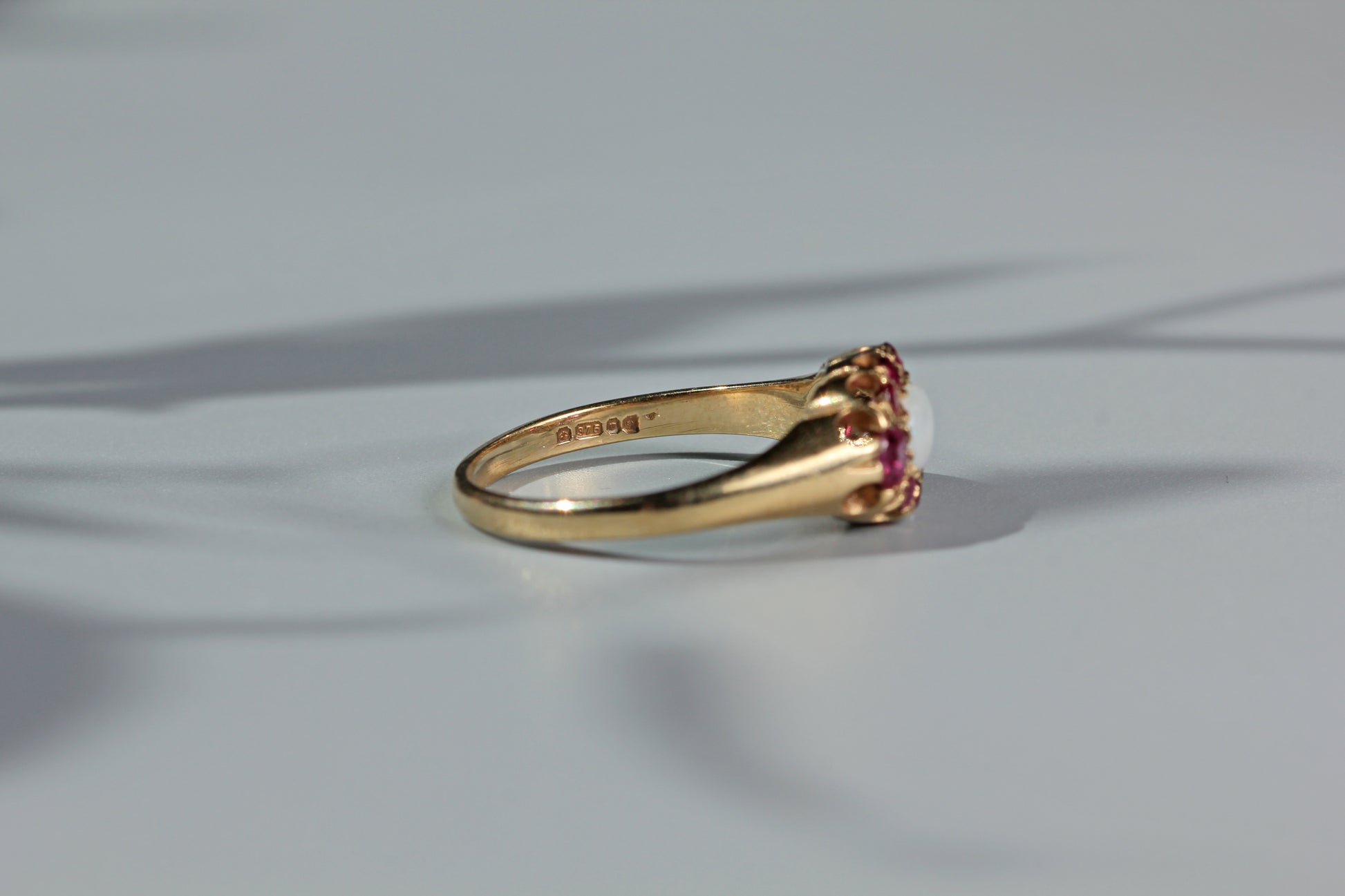 Close up of gold hallmarks on vintage ring