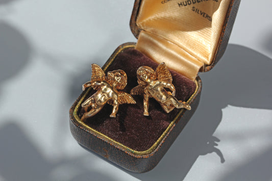 Vintage cherub stud earrings in sterling silver with gold gilt finish
