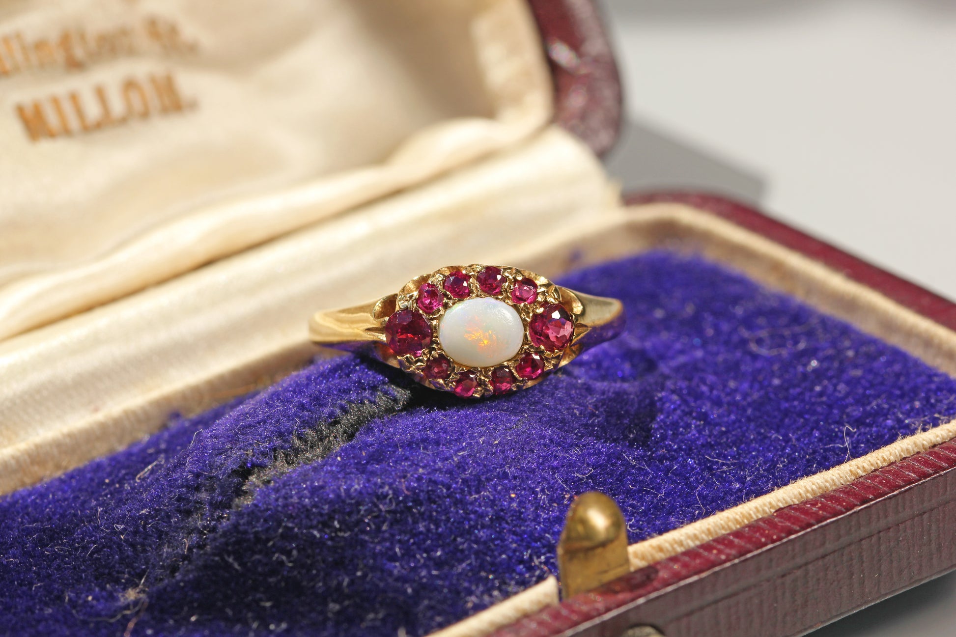 Vintage 9ct gold opal and ruby cluster ring with marquise-shaped cluster