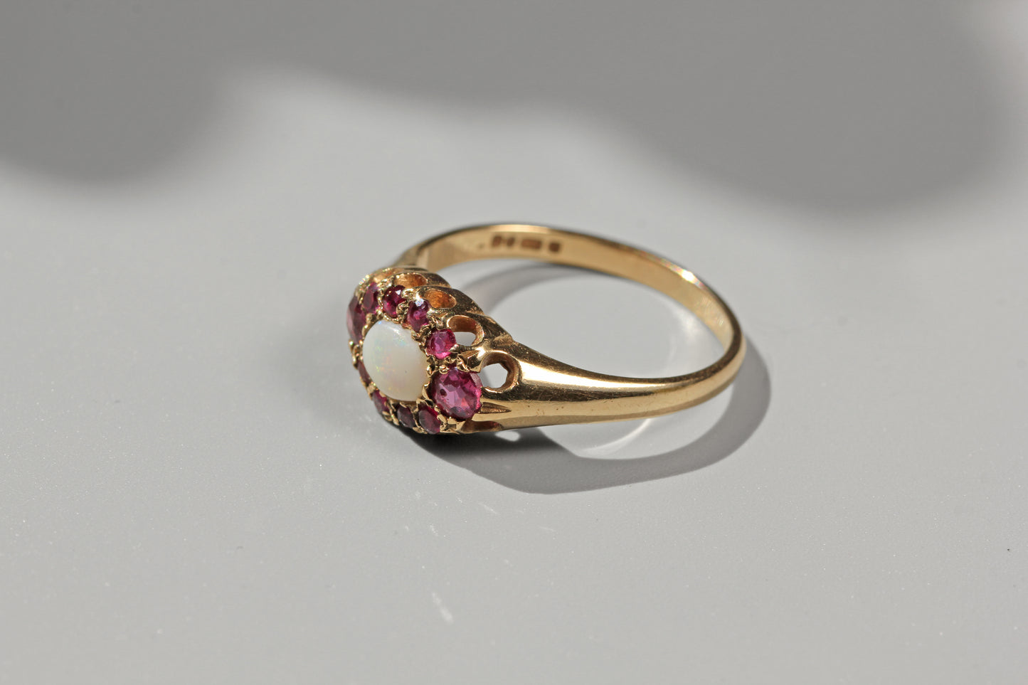 vintage engagement ring with rubies and opal